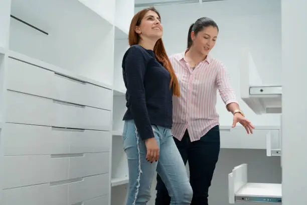 Closet company consultation for custom closet systems, highlighting KBR Closet’s expertise in home office storage.