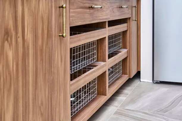 Custom closet systems for pet owners with slide-out bins