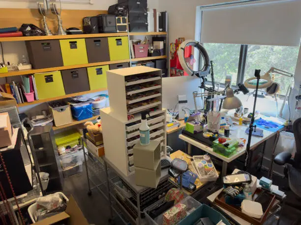 custom closet systems for hobby rooms with cluttered supplies
