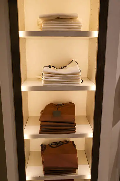 Custom closet systems for high ceilings with LED lighting