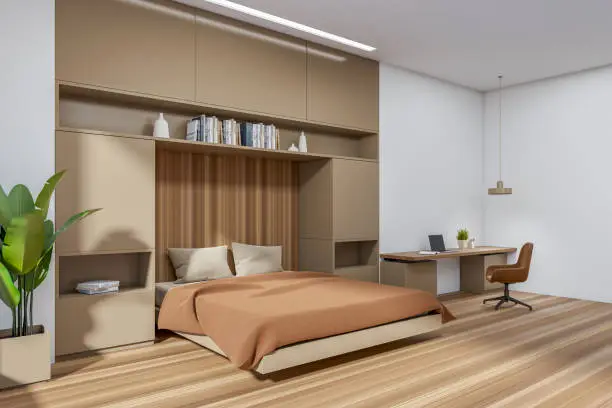 A small room with a folded-up Murphy Bed, revealing a spacious, organized area with built-in storage and a desk